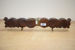 A mid / late 20th century Indian carving set, carved depicting a double headed dragon on brass