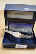 A Seiko stainless steel wristwatch, the octagonal silver dial having baton numerals, on a