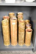 A group of 8 brass Trench Art vases decorated with dates for c.1919 and c.1918, (8)