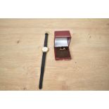 A lady's gold plated Montine wrist watch having baton numeral dial to champagne face in circular