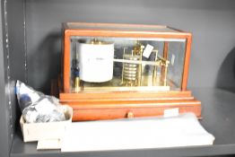 An early 20th century mahogany cased barograph with gilt brass mechanism and clockwork recording