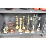 A pair of early 20th century brass barley twist candlestick, h29cm, sold together with another