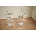 A pair of vintage crystal glass ballroom dancer studies, measuring 25cm and 27cm.