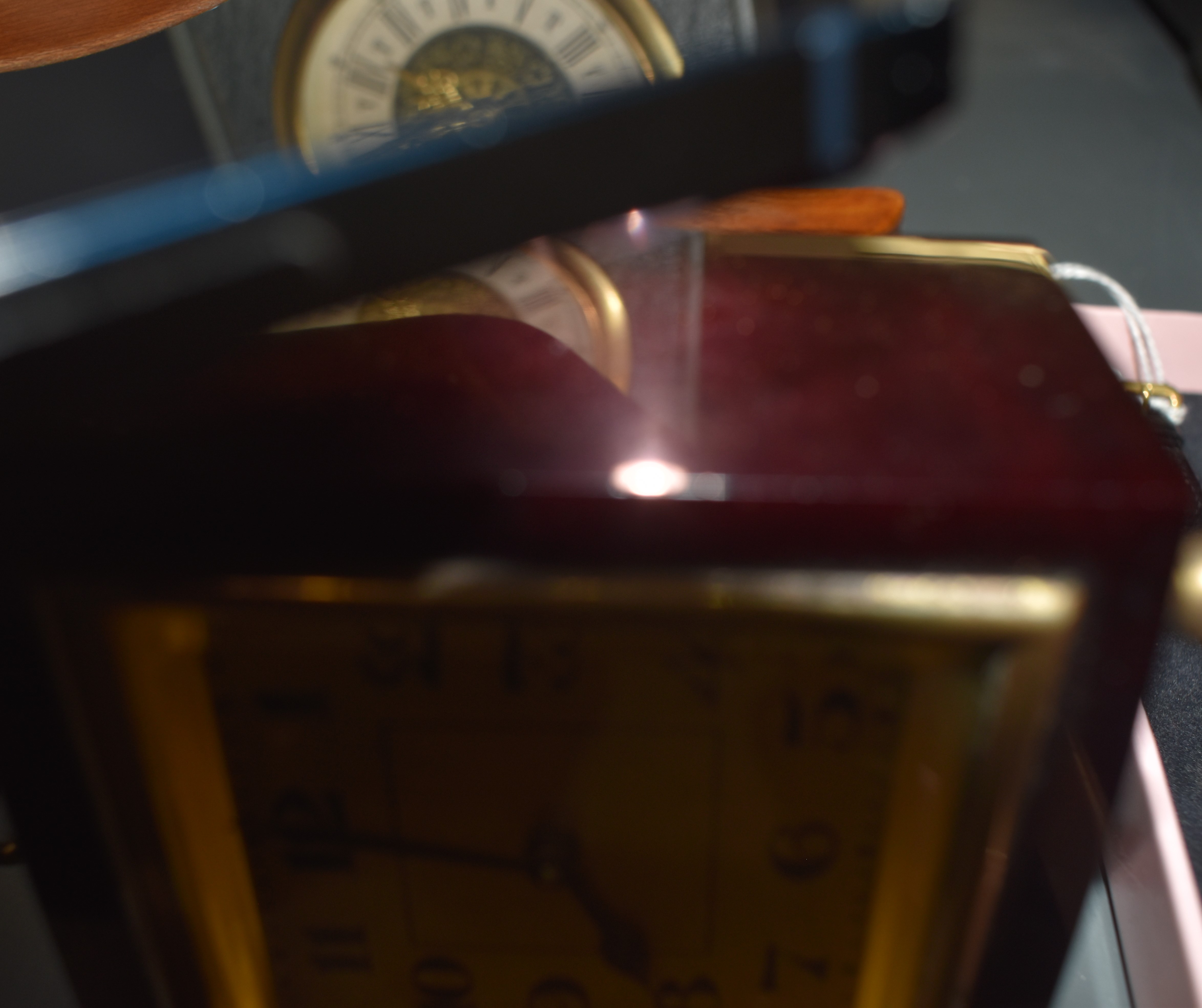 An early 20th century deep red bakelite miniature travel clock, H10cm, sold together with various - Image 5 of 5