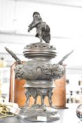 A large Meiji period Japanese bronze censor, the lid modelled as a male worrier, the central section