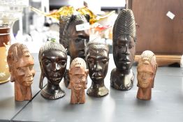 A group of hand carved African hardwood sculptural busts, ( 7 ).