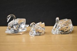 A group of three Swarovski Crystal Swan studies, complete with boxes.