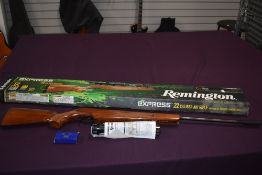 A Remington Express .22 Air Rifle, scope present, fibre optic sights fitted, barrel length 82cm,