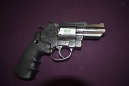 An ASG Dan Wesson CO2 .177 BB Revolver with black pistol grip and serial number 13A49268, Purchaser