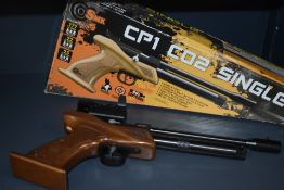 A SMK Victory CP1 CO2 Single Shot .177 Air Pistol with brown pistol grip, sight fitted, in