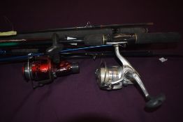 A selection of fishing gear including 3 rods, 2 reels and landing nets