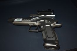 A KWG Tanfoglio Gold Custom CO2 .177 Air Pistol with silver pistol grip and serial number 30444656