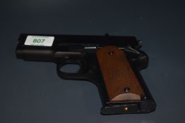 A WE M1911 Mini CO2 .177 Air Soft Pistol with brown pistol grip, Purchaser must be over the age of