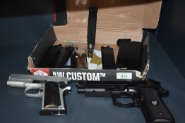 Two model Pistols for repair, Detonics 45 and unnamed along with seven spare magazines, Purcahser