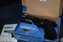 A Hammerli S26 CO2 .177 Air Pistol with black pistol grip and serial number 13G39143, Securitying