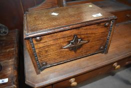 A late 19th or early 20th Century oak specimen trinket or similar box modelled as a coffer,width