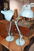 A pair of reproduction vintage style angle poise lamps