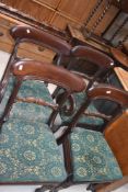 A set of four (three plus one) 19th Century mahogany railback dining chairs