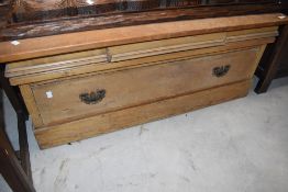 A 19th Century pine wardobe base converted to useful bench, width approx. 117cm