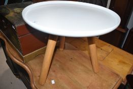 A Normann Copenhagen three legged occasional table, in the Eames style, width approx. 50cm