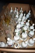A large collection of glass and ceramic bells including eleven Wedgwood in assorted patterns,