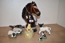 A ceramic horse head bust with faux leather and brass bridle, a Border Fine Arts 'Pooh at home'