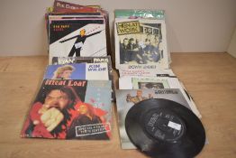 A selection of single records including the likes of Eurithmics, Ultravox, Musical Youth and Wah!