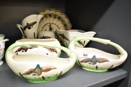 A collection of six Flying Duck and Cattails Sylvac planters and jug sold along with a an HB Quimper