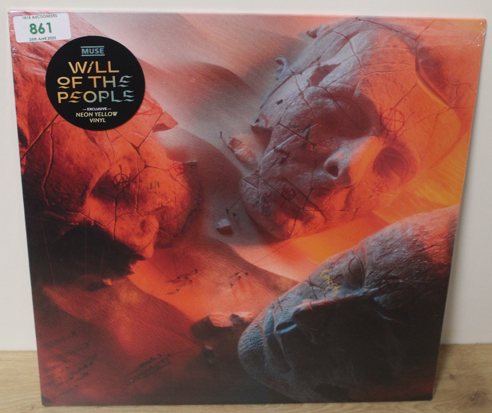 A sealed / new copy of the 20222 edition of Muse's ' Will of the People ' yellow / neon vinyl