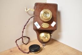 A vintage brass and mahogany wall mounted 'Weaving Shed' telephone transmitter/receiver