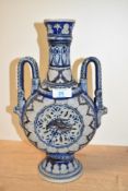 A German Rhenish pottery moon flask, of typical form with bands of repeating motifs, central pierced