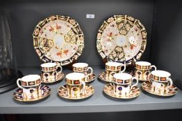 A group of eight Royal Crown Derby bone china 1128 Imari pattern coffee cans and saucers, with