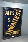 A vintage mirrored Thwaites Ales & Stout advertising sign within stained wooden surround 48cm x