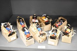 A collection of eight Robertson's Jam 'Band' figures, each modelled playing musical instruments, and