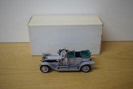 A Franklin Mint 1:24 scale die-cast, 1907 Rolls Royce Silver Ghost, in original packaging with oute