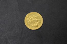 A 1817 George III Gold Sovereign, George & Dragon Royal Mint, 7.9g, possible ex mount