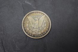 A 1889 USA Silver One Dollar, New Orleans Mint, 13 stars, 26.3g