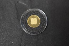 A Bradford Exchange 2018 Gold Quarter Sovereign, Lest We Forget, Tristan Da Cunha, 22 carat, 2g,