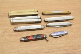 A group of 5 miniature mother of pearl mounted folding pocket knifes, largest L6.3cm, sold