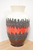 A West German fat lava style vase, decorated with red glaze and geometrical patterns, impressed mark