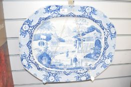 A large blue and white meat plate decorated with Chinese landscape scene, L51cm