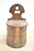 An oak salt / candle box of barrel form, h25cm