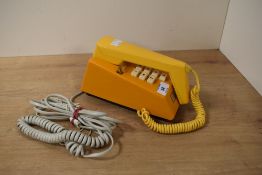 A two tone vintage telephone, L21cm