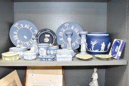 A quantity of Wedgwood Jasper ware, to include a pair of candlesticks, plates and trinket boxes,