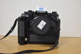 A Canon A-1 camera with Canon Data Back A and Tamron CF Macro 28-50mm f3.5-4.5 lens.