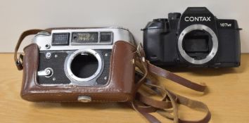 Two camera bodies. A Fed 4 and a Contax 167MT
