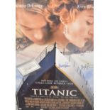 A framed and signed Titanic movie poster, signed by Kate Winslett, Leonardo DiCaprio, Billy Zane and