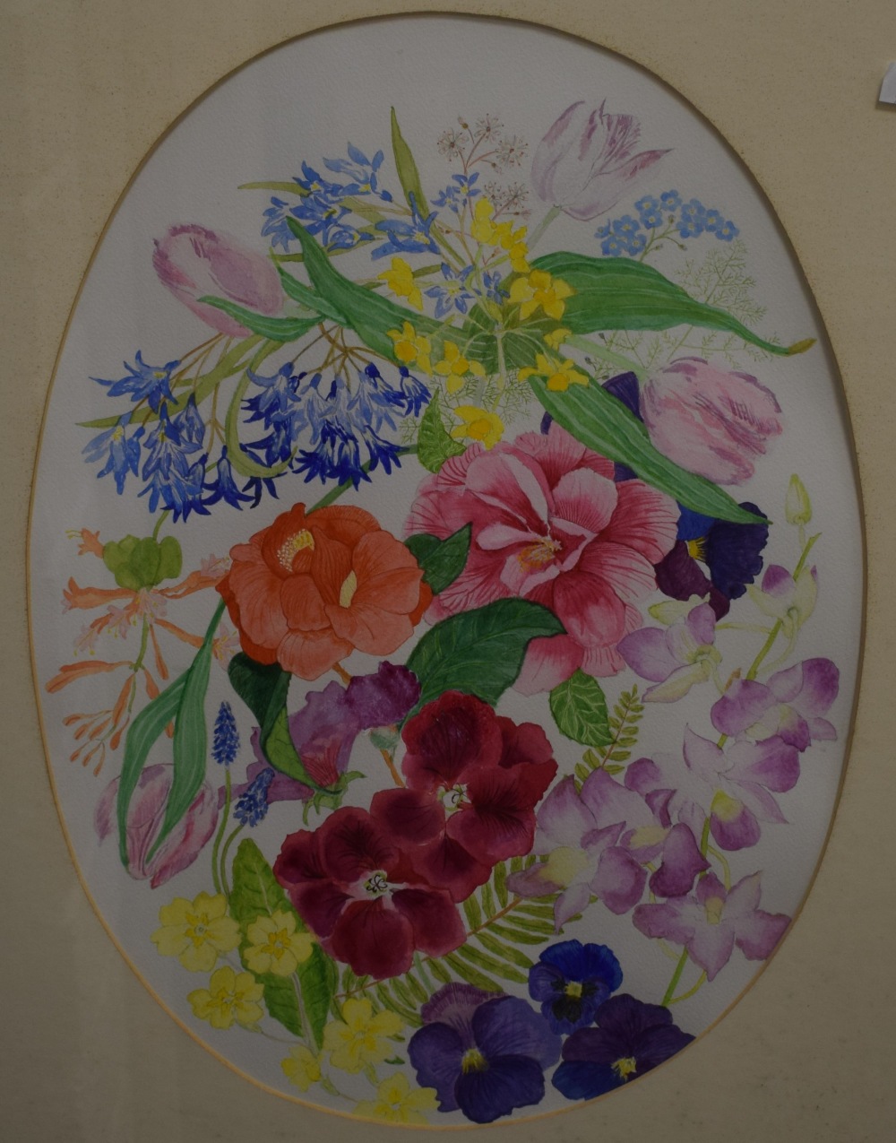 Artist unknown, 20th century oval watercolour, colourful study of flowers, within a card mount and