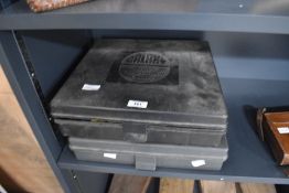 Two 33cm square fishing tackle boxes containing hooks lures and floats