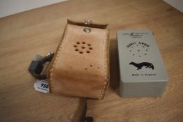 A Deben Mk1 ferret finder in its leather case with colar and transmitter